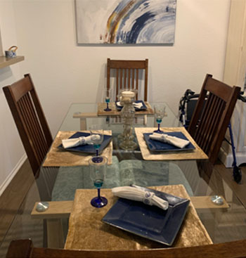 Photo of a nicely set dining room table. 