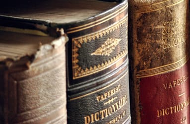 Close-up image of three books.