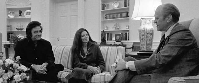 Country and Western Singers Johnny Cash and June Carter Cash Visit President Gerald R. Ford at the White House. November 21, 1975. White House Photographic Office Collection (Ford Administration), National Archives.