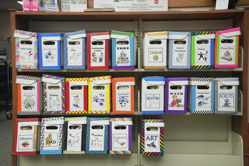 Colorful boxes or organized early learning materials with topics like food, imagination, and feelings. Photo copyright Terry Lorant.