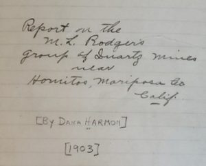 Photo of a handwritten document on lined, white paper, which reads: Report on the M.L. Rodgers group of quartz mines near Hornitos, Mariposa Co Calif. By Dana Harmon, 1903.