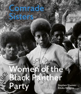 Black and white photograph of five African American women wearing Black Panther shirts standing outside at a rally. Title of book is printed over this at the top in blue and in white at the bottom reading "Comrade Sisters: Women of the Black Panther Party" by authors "Stephen Shames Ericka Huggins."